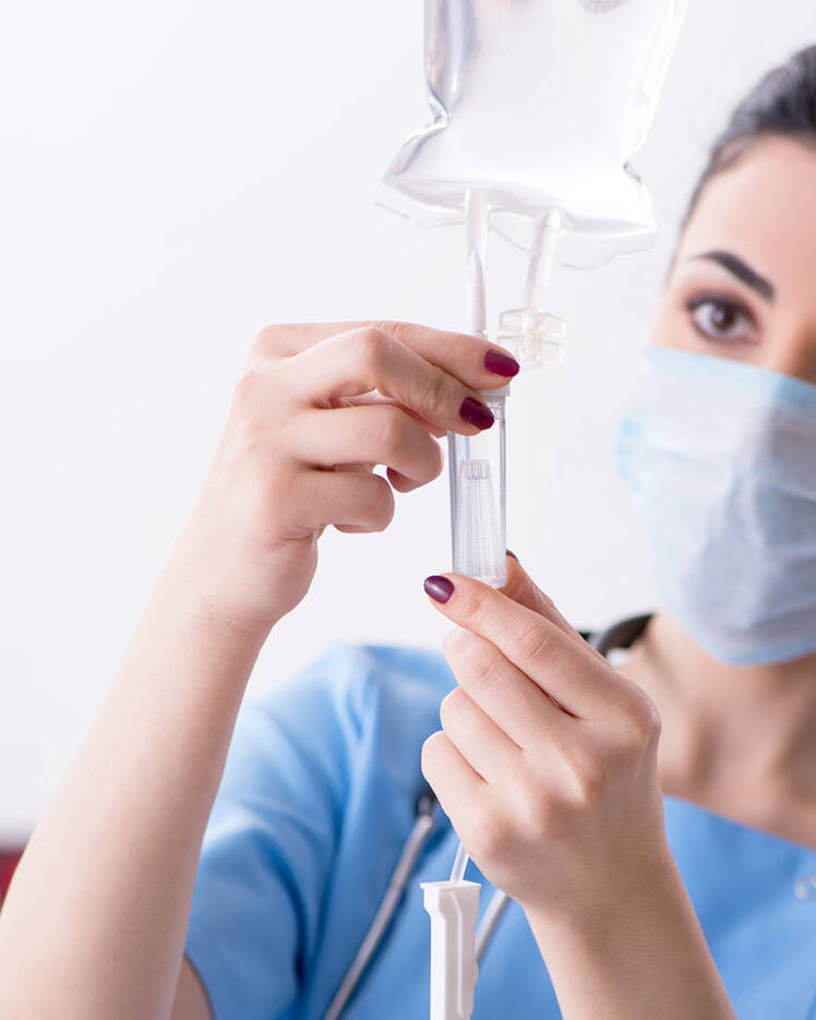 Virginia Beach Ketamine and Wellness | woman checking on iv infusion drip