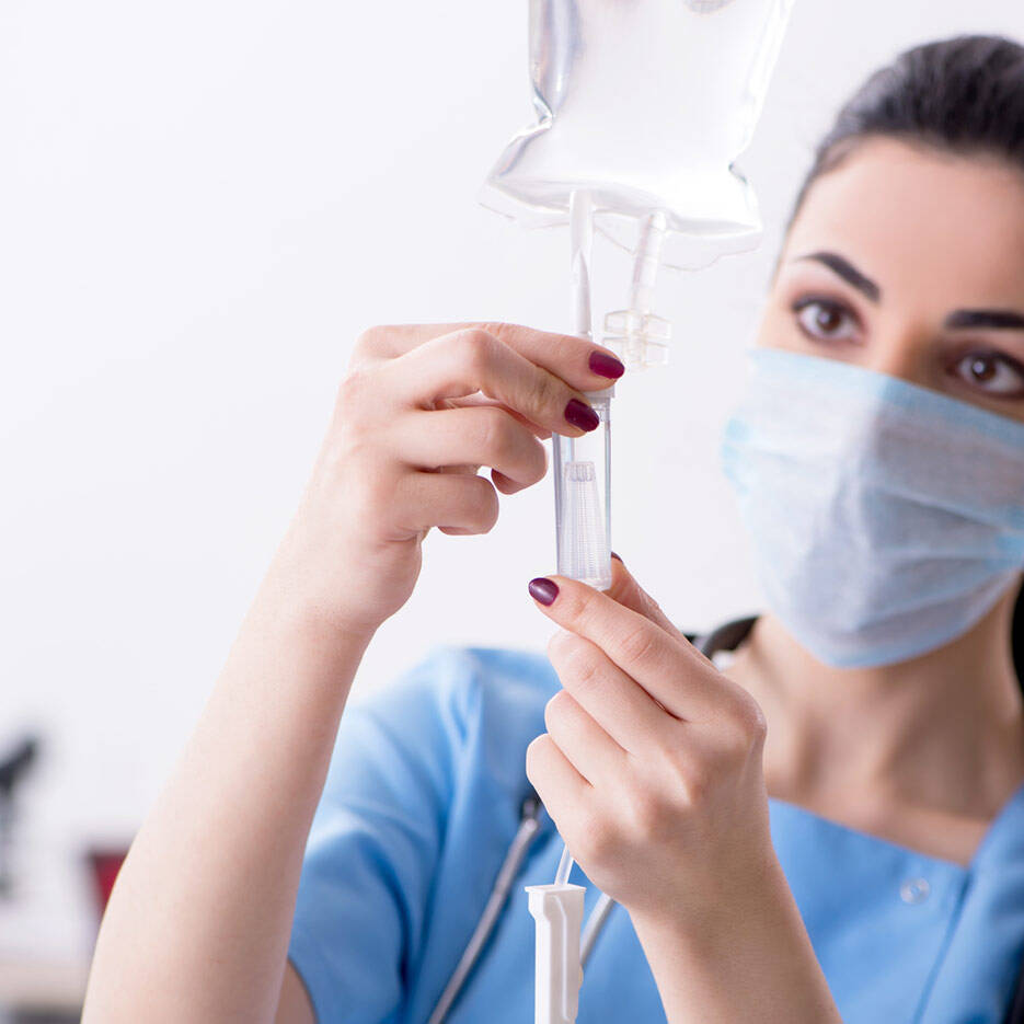 Virginia Beach Ketamine and Wellness | woman checking on iv infusion drip